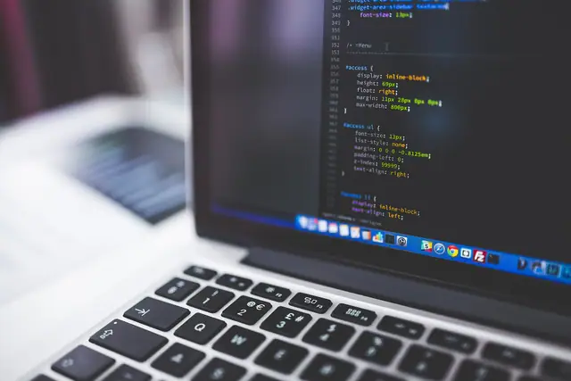 Laptop with code on screen